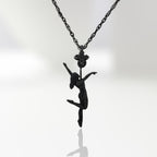 Black oxidized pole dance necklace in 925 sterling silver – bold, sensual, and full of feminine energy. This pendant captures a woman in motion, wrapped around the pole with elegance, grace, and raw confidence.

Designed for women who express power through movement and embrace their sensuality unapologetically. With its dark, matte finish and sculptural detail, it’s a striking piece of erotic body art – both empowering and intimate.