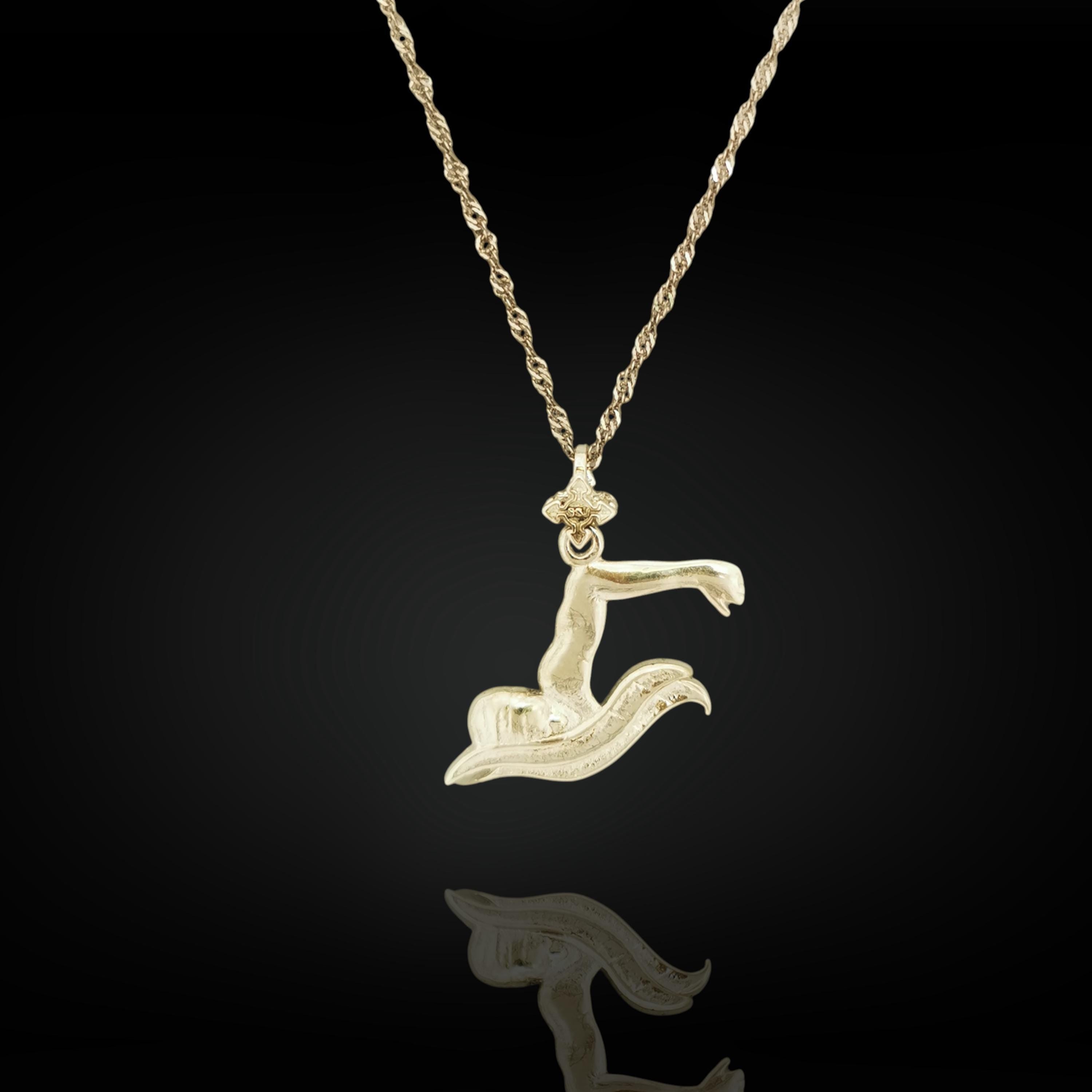 Classic breaststroke necklace handcrafted from solid 925 sterling silver — a clean and athletic pendant designed for swimmers, coaches, and young athletes.

The pendant captures a male swimmer mid-stroke in the breaststroke technique — strong, focused, and in control. Cast in bright silver, this piece celebrates discipline in the water and the elegance of sport. Ideal for boys and men dedicated to competitive swimming and steady improvement.