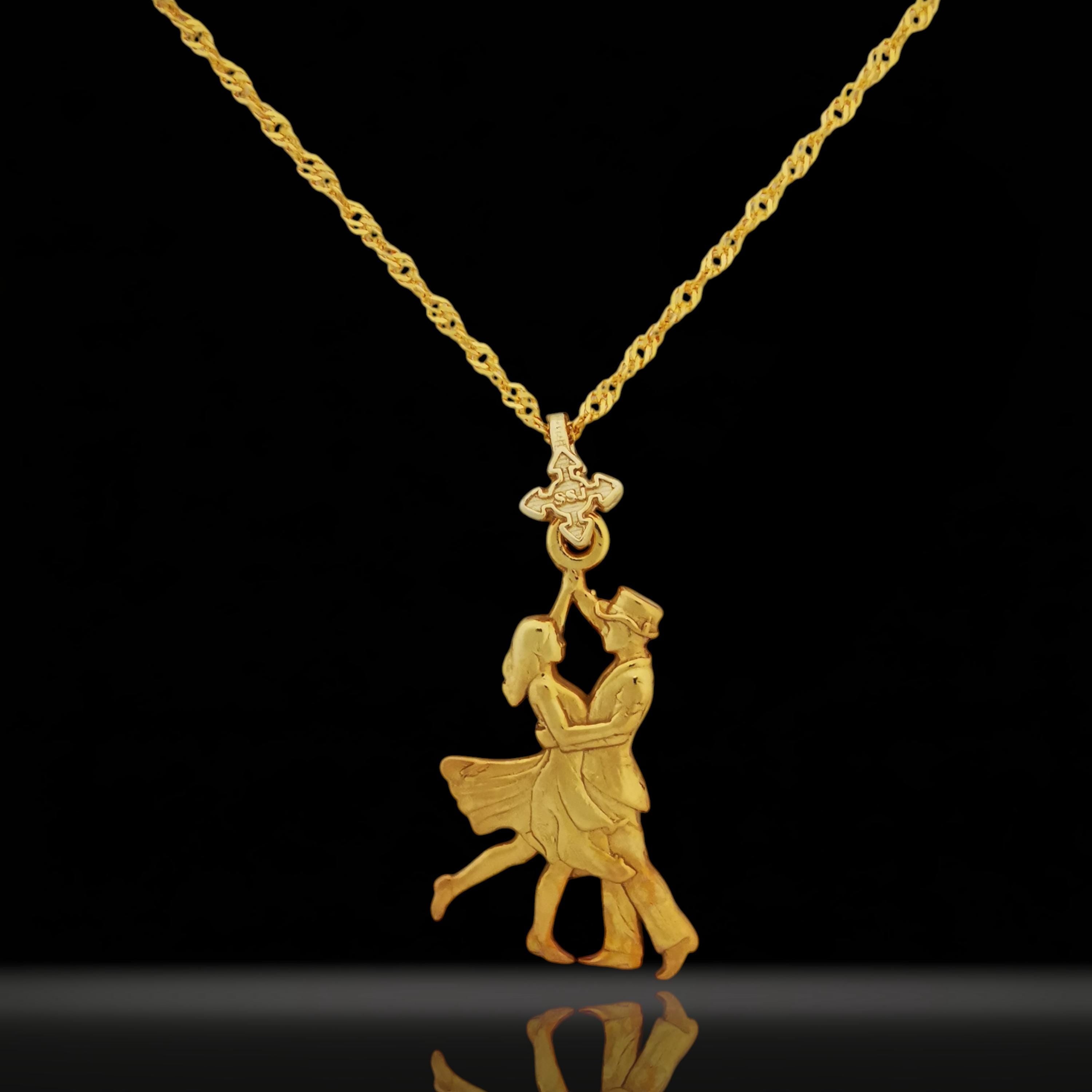 Celebrate elegance, connection, and timeless romance with this handcrafted gold-plated sterling silver tango pendant. Featuring a dancing couple mid-motion, this detailed design captures the graceful energy of Latin dance — the perfect symbol of love and harmony.

This is more than a piece of jewelry — it’s a tribute to movement, passion, and the soulful bond between two people.