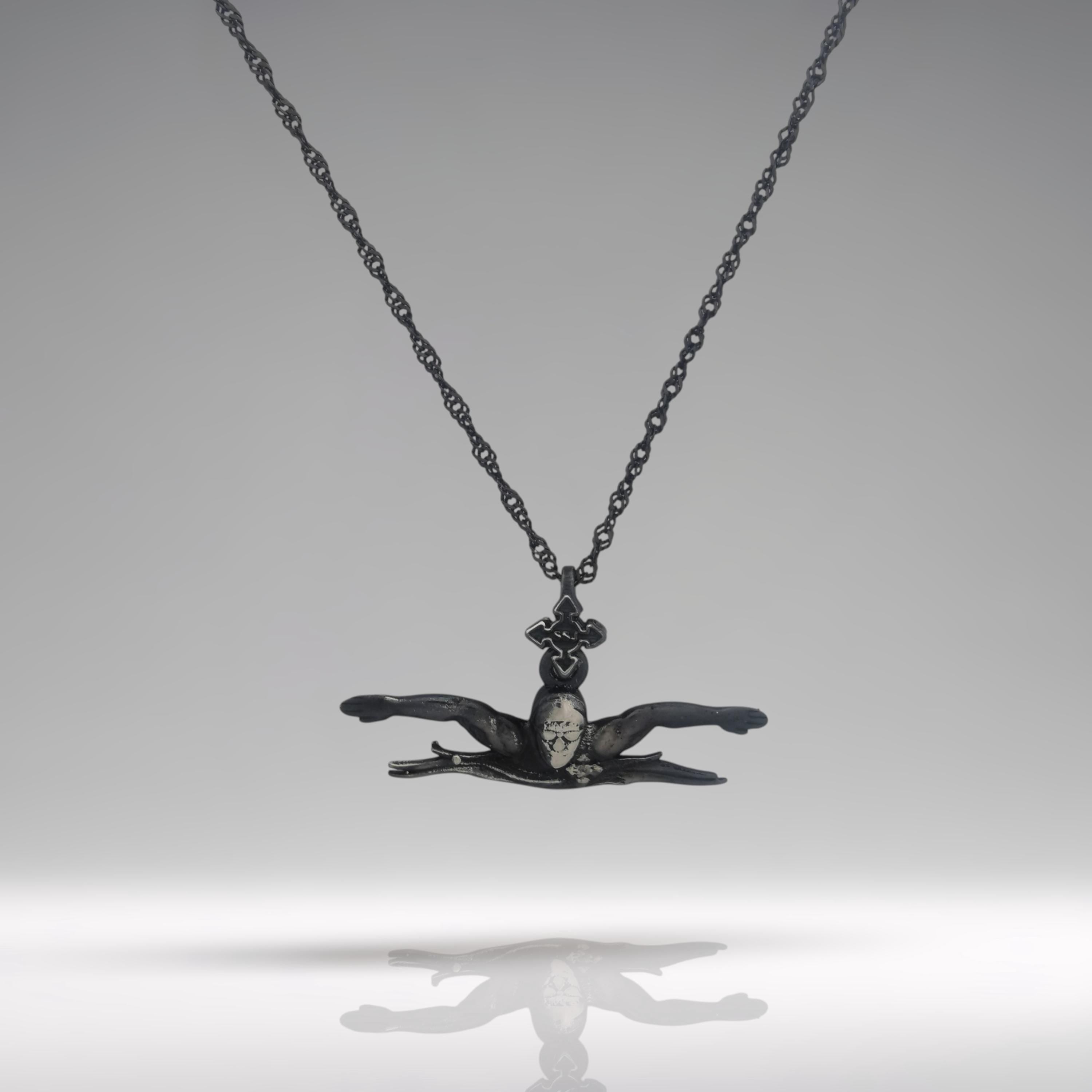 Vintage-style butterfly swimming pendant handcrafted from 925 sterling silver — designed for men and teen boys who channel power and rhythm through water.

With an antique-inspired patina, this piece captures a swimmer mid-stroke, arms extended in motion, reflecting focus, tradition, and the timeless drive of aquatic sport. A meaningful gift for athletes and water lovers who carry the spirit of swimming with them always.