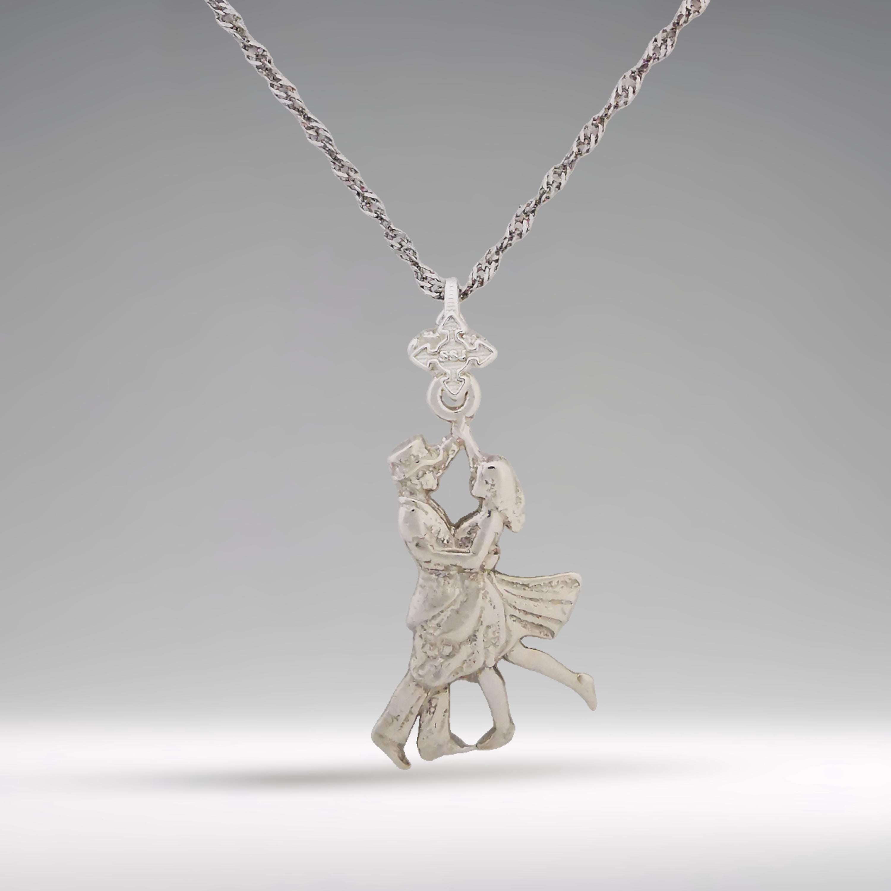 This 925 sterling silver tango necklace captures the grace and emotion of a dancing couple in motion. A romantic piece for women who cherish love, rhythm, and elegance. Whether she&#39;s a dancer or simply inspired by the connection of two souls moving as one, this pendant makes a beautiful and meaningful gift.