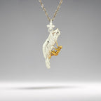 Two-tone climbing necklace crafted from solid 925 sterling silver with partial gold plating — an expressive pendant for men and women who live to explore, conquer, and move beyond the ordinary.

Featuring a detailed climber suspended in motion, the design fuses the strength of sterling silver with the warmth of gold accents. A powerful symbol of resilience, focus, and the thrill of vertical adventure. Ideal for those who appreciate bold design and a connection to nature.