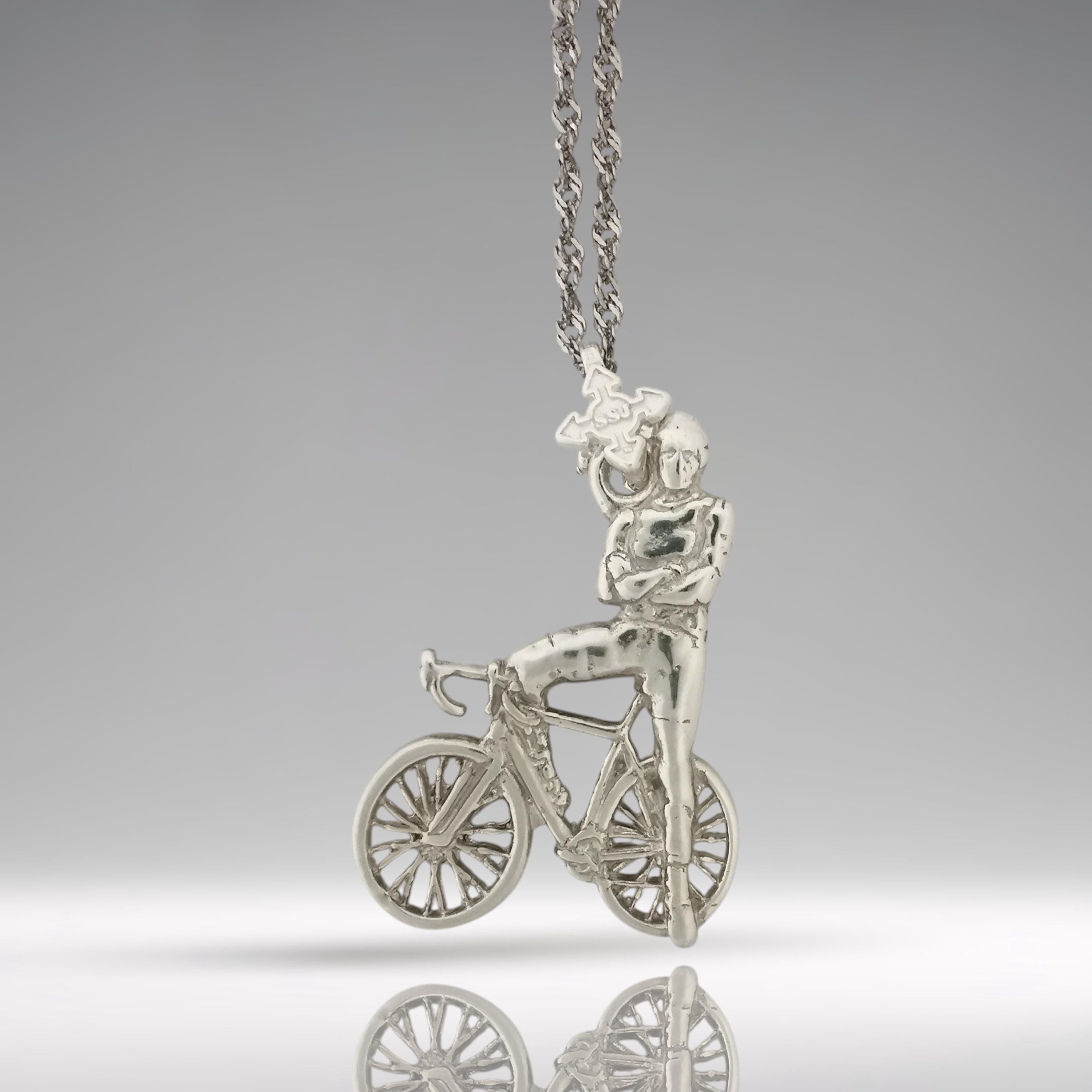 Classic cyclist necklace handcrafted from solid 925 sterling silver — a bold pendant capturing the relaxed strength and style of a modern rider.

The design features a male cyclist confidently posed against his bike, arms folded with pride — a statement of endurance, self-discipline, and athletic drive. Cast in polished classic silver, this piece radiates energy, identity, and timeless masculinity.