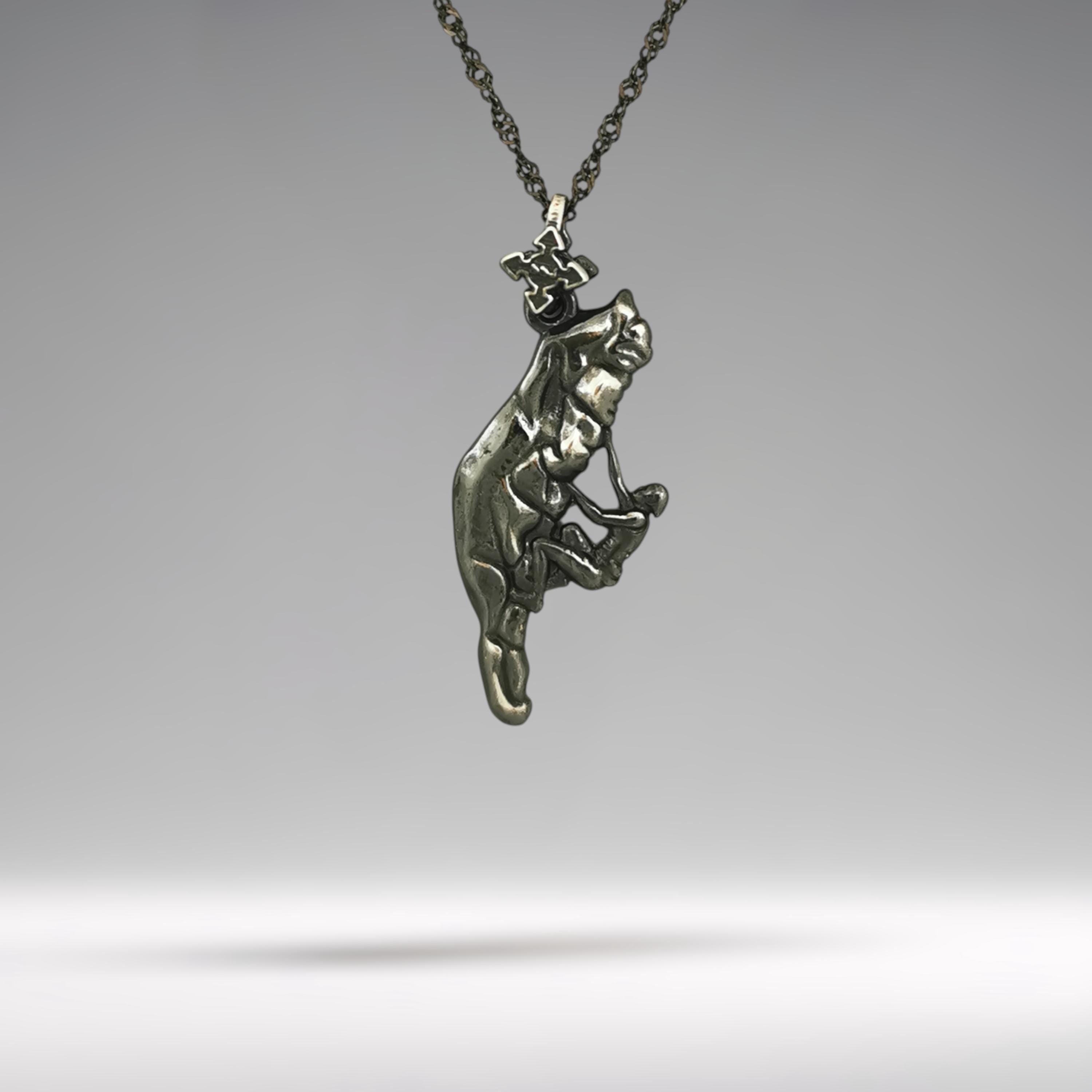 Vintage-style rock climbing necklace handcrafted from solid 925 sterling silver with an antique patinated finish — a rugged and expressive pendant for men and women who rise to meet every challenge.

This pendant captures a climber mid-motion, rope in hand and body in action. The aged silver texture adds depth and character, highlighting grit, control, and spirit. Ideal for mountain lovers, outdoor athletes, and adventurers who honor both tradition and boldness.