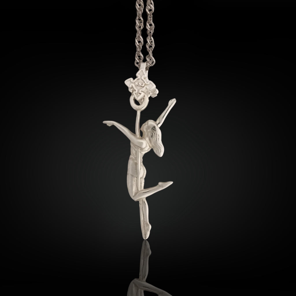 Pole dance pendant for women handcrafted in solid 925 sterling silver – a sleek design featuring a dancer wrapped around a vertical pole.

Clean silver tones and smooth lines highlight confidence, movement, and personal expression. A meaningful piece for women who celebrate strength and grace through motion.