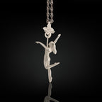 Pole dance pendant for women handcrafted in solid 925 sterling silver – a sleek design featuring a dancer wrapped around a vertical pole.

Clean silver tones and smooth lines highlight confidence, movement, and personal expression. A meaningful piece for women who celebrate strength and grace through motion.