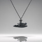 Freestyle swimming necklace crafted in oxidized black 925 sterling silver — a bold and dynamic pendant honoring speed, strength, and aquatic motion.

This handcrafted piece captures a male swimmer mid-stroke in a freestyle pose, with sleek lines that evoke precision and control in the water. The matte black finish adds modern edge and intensity, making it a meaningful piece for professional swimmers, fans of water sports, or anyone who lives with power and purpose.