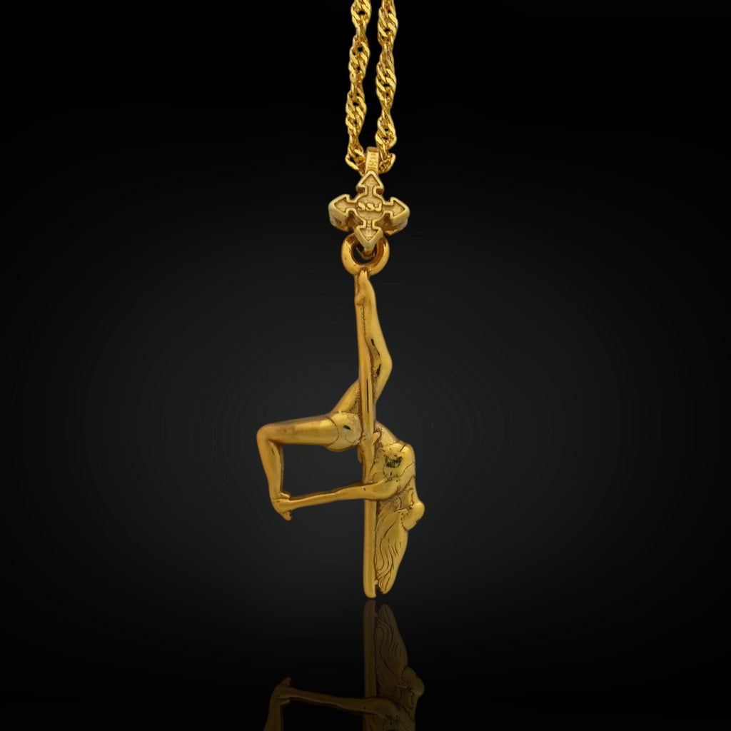 Gold-plated pole dance pendant crafted from solid 925 sterling silver — a radiant and daring symbol of feminine power, movement, and elegance.

The pendant features a dancer in a captivating upside-down pose, full of grace and expression. The luxurious gold finish enhances every curve and detail, turning this piece into a celebration of sensuality, freedom, and self-confidence. Whether for a performer or admirer of pole artistry, this necklace is a golden tribute to beauty in motion.