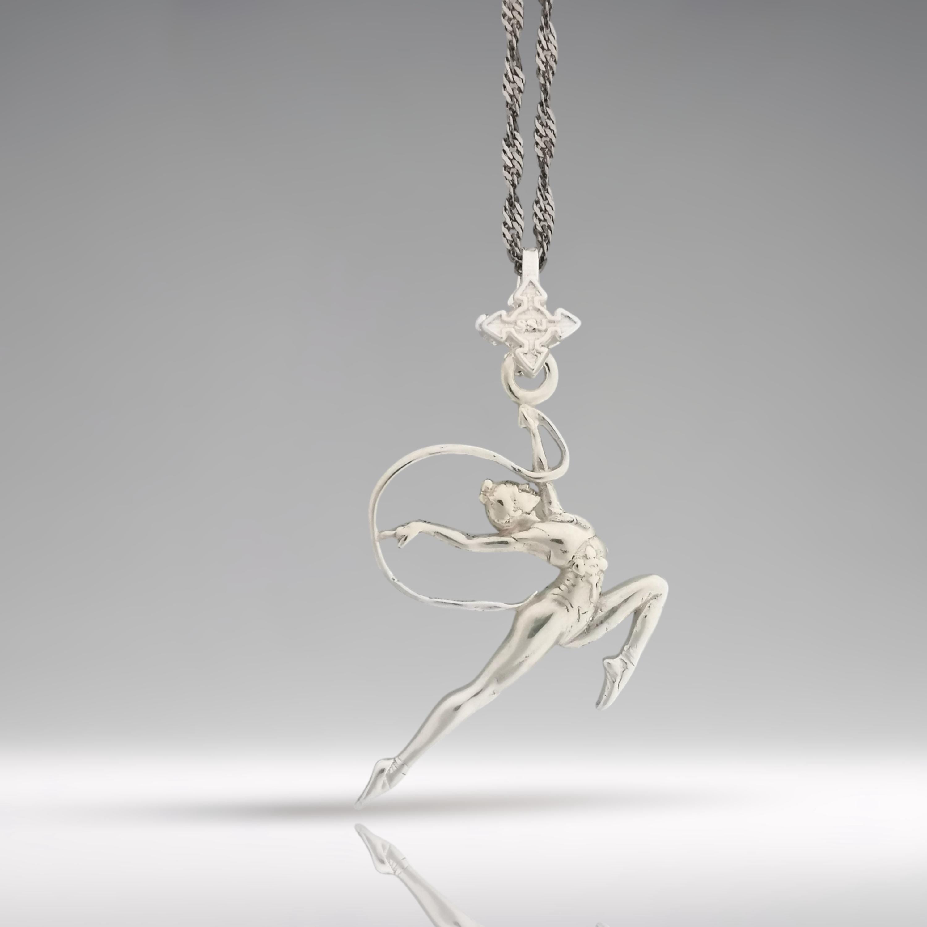 Elegant gymnastics pendant in Classic Silver – rhythmic movement captured in solid 925 sterling silver for gymnasts, dancers, and athletic young women.

🎁 Perfect gift for:
• Rhythmic gymnasts, coaches, fans
• Girls, teen athletes, dancers
• Competition success, birthday, team spirit
