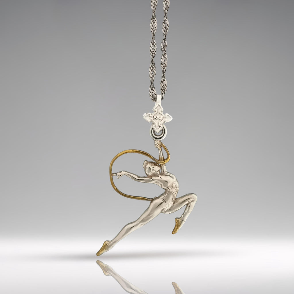 Rhythmic gymnastics pendant in 925 silver with partial gold plating – premium handcrafted jewelry for girls who move with elegance, confidence, and artistry.

🎁 Perfect gift for:
• Rhythmic gymnasts, fans, coaches
• Girls, teen athletes, dancers
• Sport achievements, motivation, birthdays