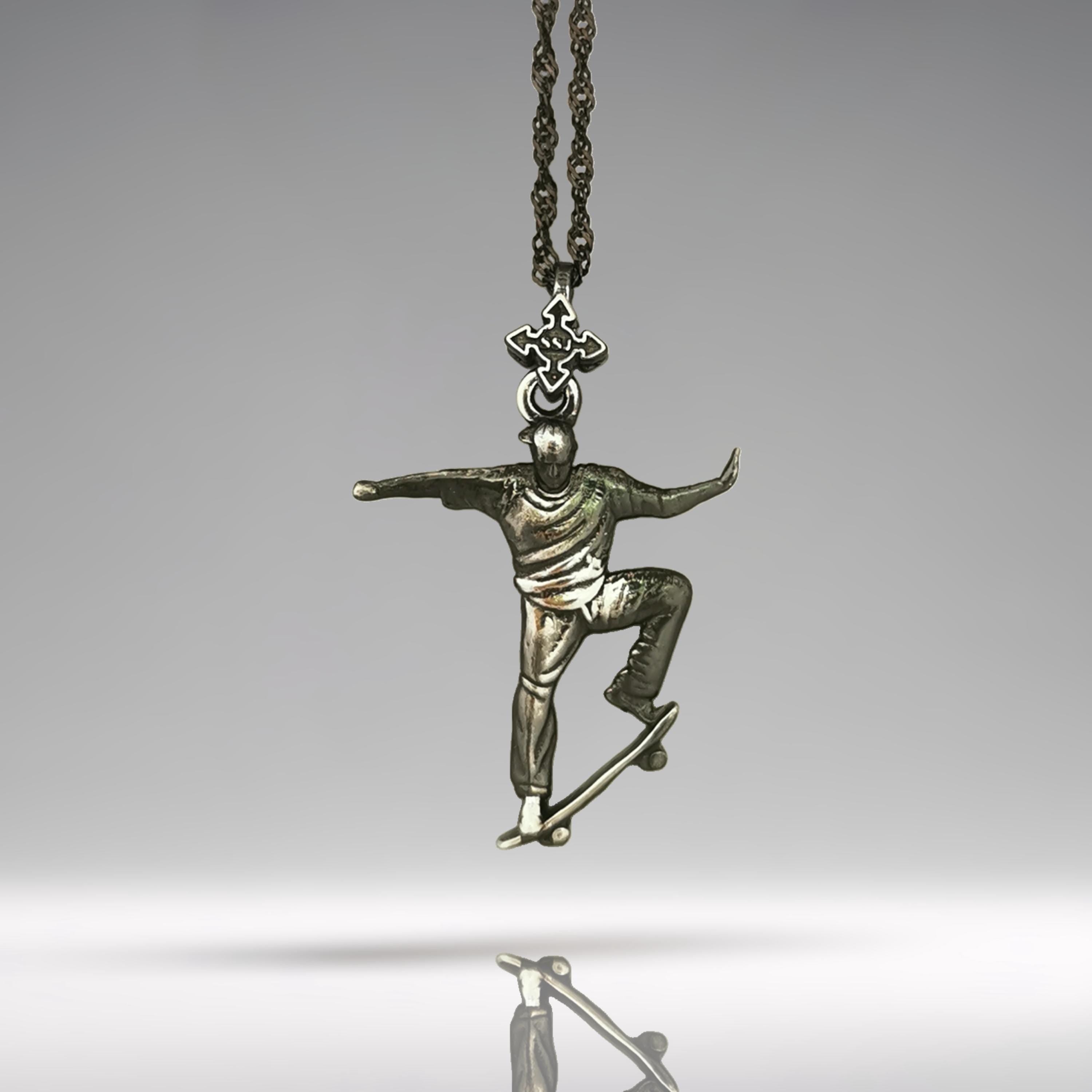Vintage style skateboard necklace for men made from solid 925 sterling silver with a rugged patinated finish – a bold pendant capturing a skater mid-trick. This handcrafted piece channels urban attitude, freestyle motion, and the fearless energy of street sports.

Designed for skaters who ride hard and express themselves with every move, this piece brings raw power and classic edge in one timeless symbol.