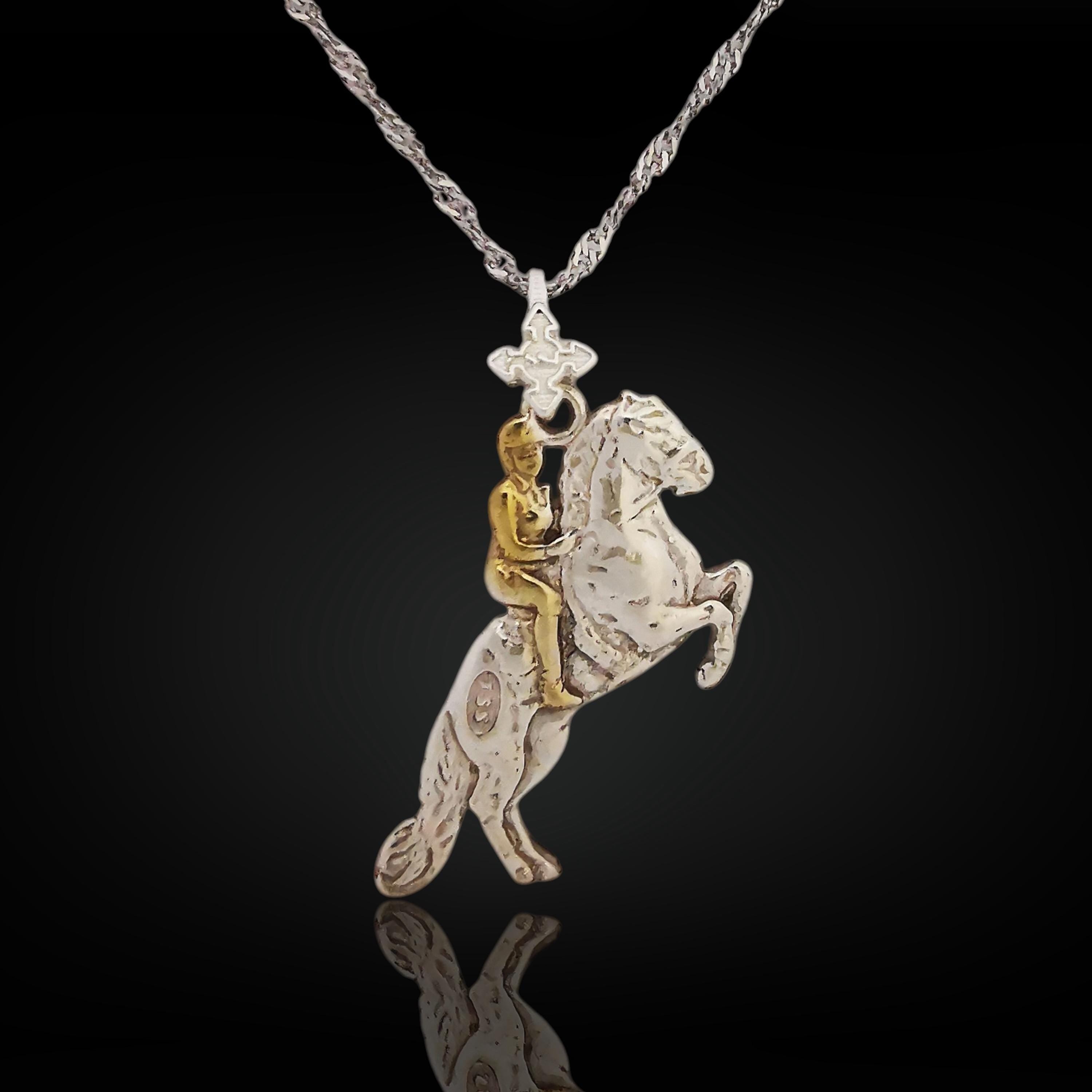 Equestrian pendant in 925 sterling silver with partial gold plating — handcrafted in the EU and perfect for birthdays, graduations, or holiday gifts. Featuring a rearing horse and rider, it captures the balance, motion, and elegance of classical riding. A timeless piece for those who value artistry, precision, and equestrian spirit.